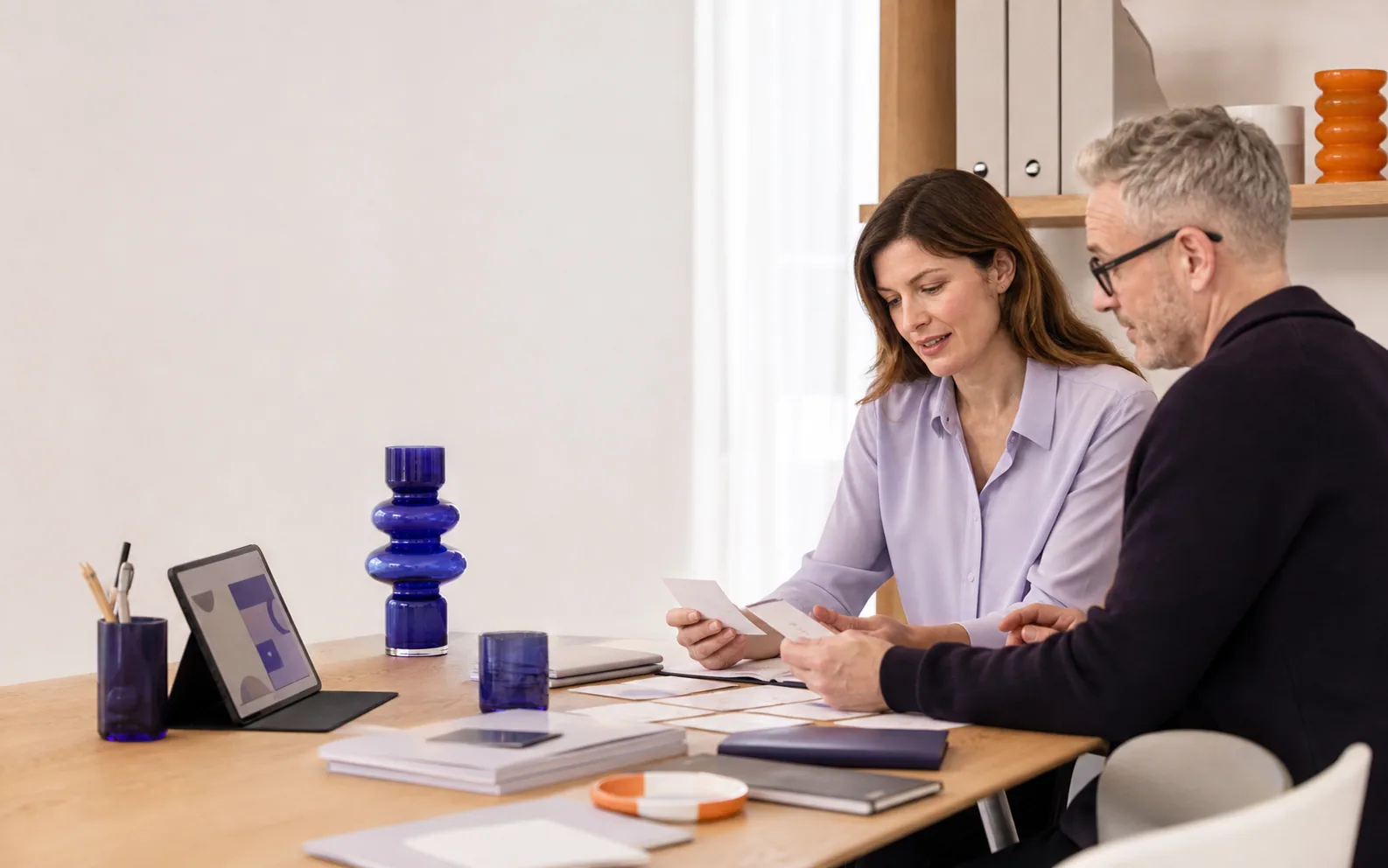 A calm care-quality review with practical documentation and a tablet