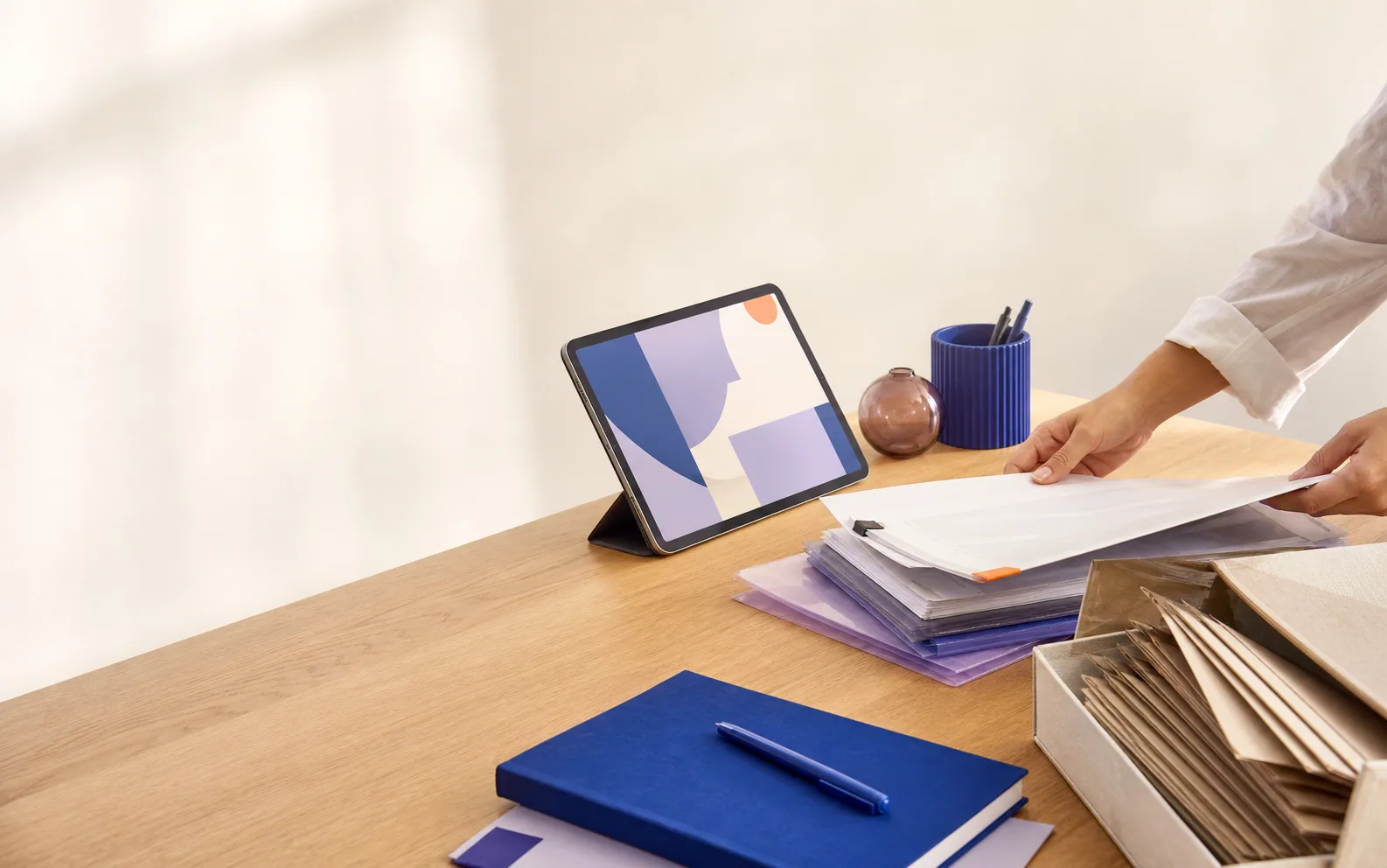 A calm, organised paperless workflow on a studio desk
